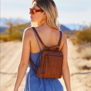 The Sak Silver Loyola Convertible Mini Backpack